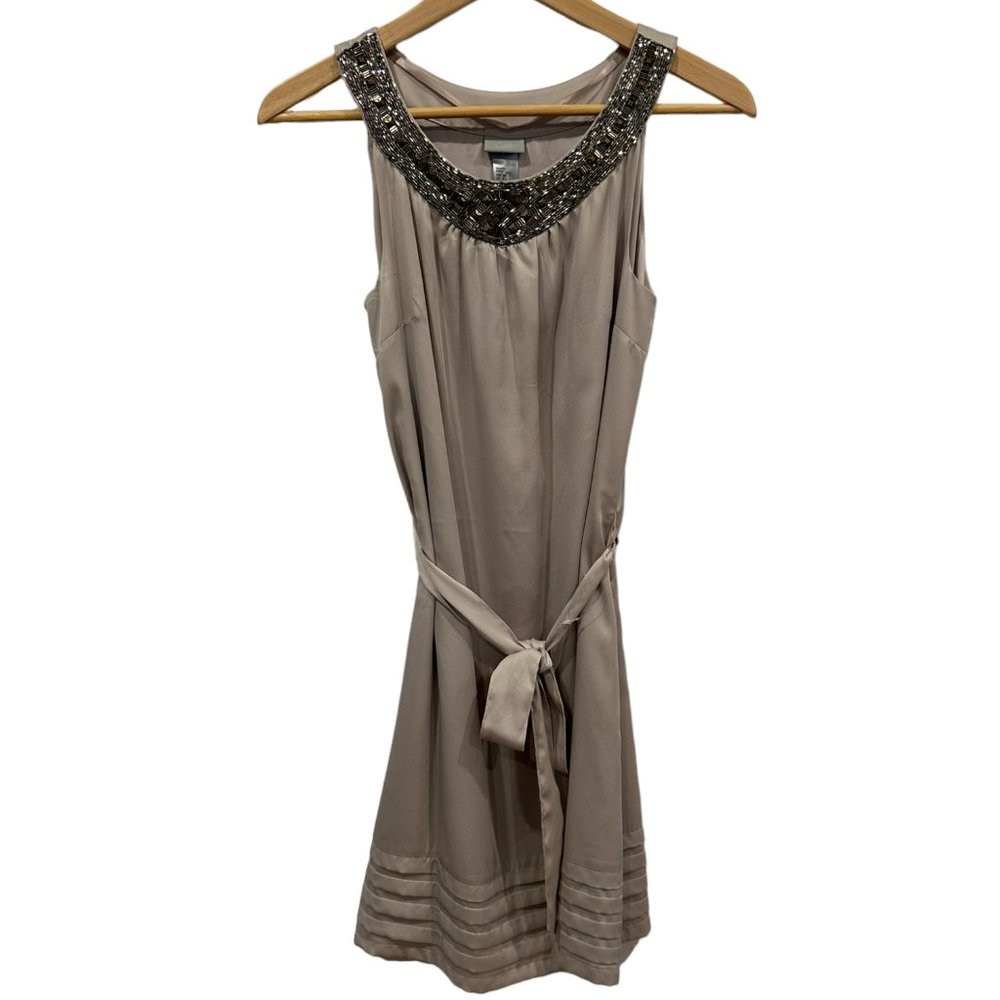 NWT H&M Rose Gold dress with ribbon belt and beaded neckline.